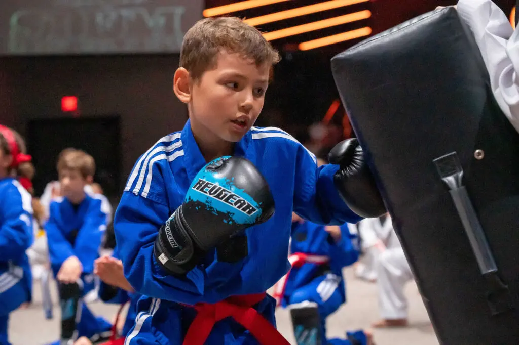 kids in Lakewood Ranch martial arts class improving focus, discipline, and listening skills through martial arts training
