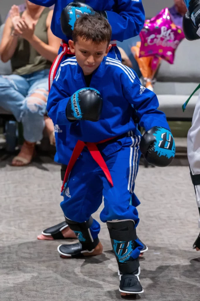 Teens in Lakewood Ranch martial arts class improving focus, discipline, and listening skills through martial arts training